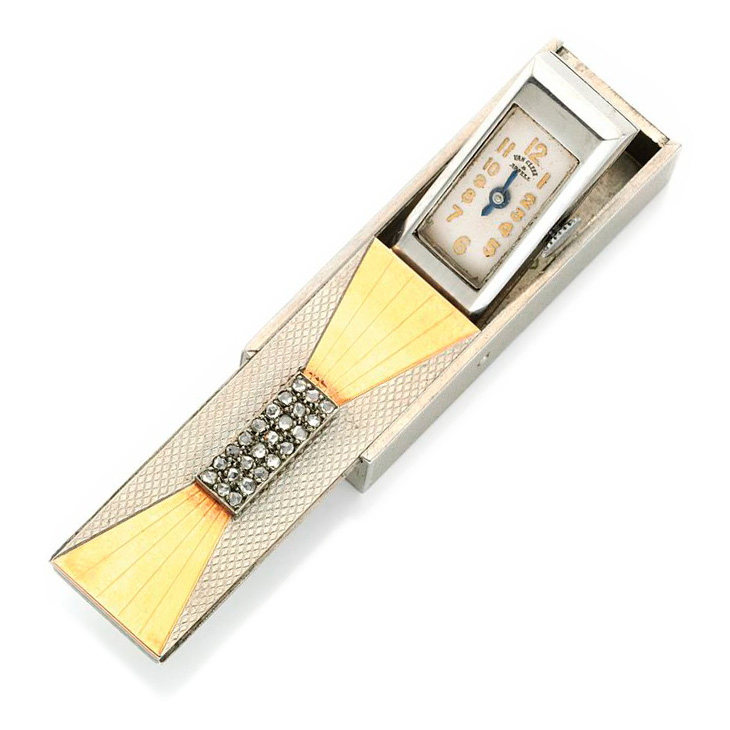 An Art Deco Gold, Diamond and Styptor Travel Clock, by Van Cleef & Arpels, circa 1940