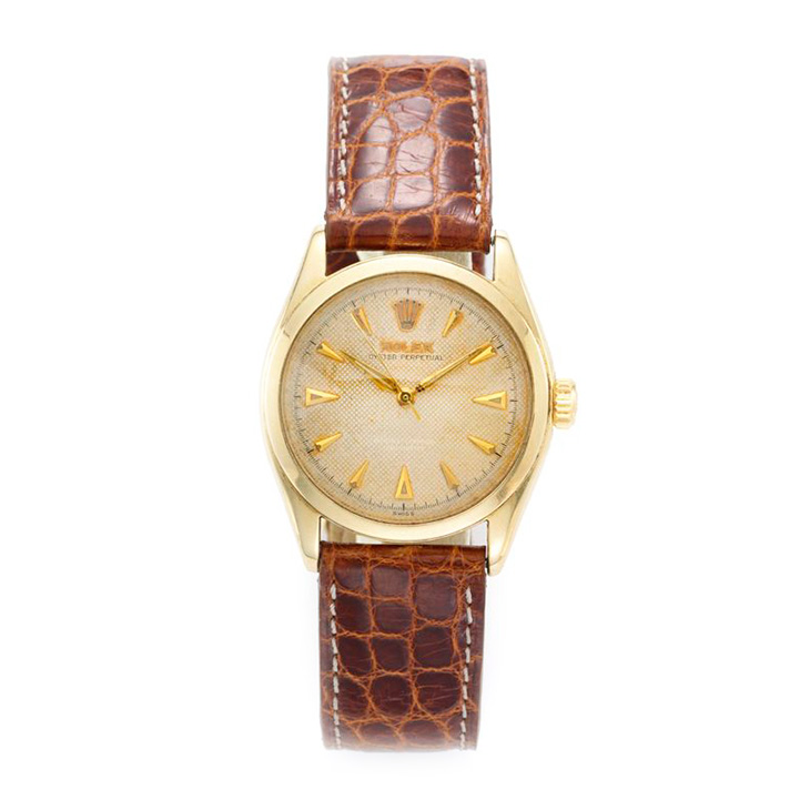 An Oyster Perpetual Gold Wristwatch, by Rolex, circa 1940