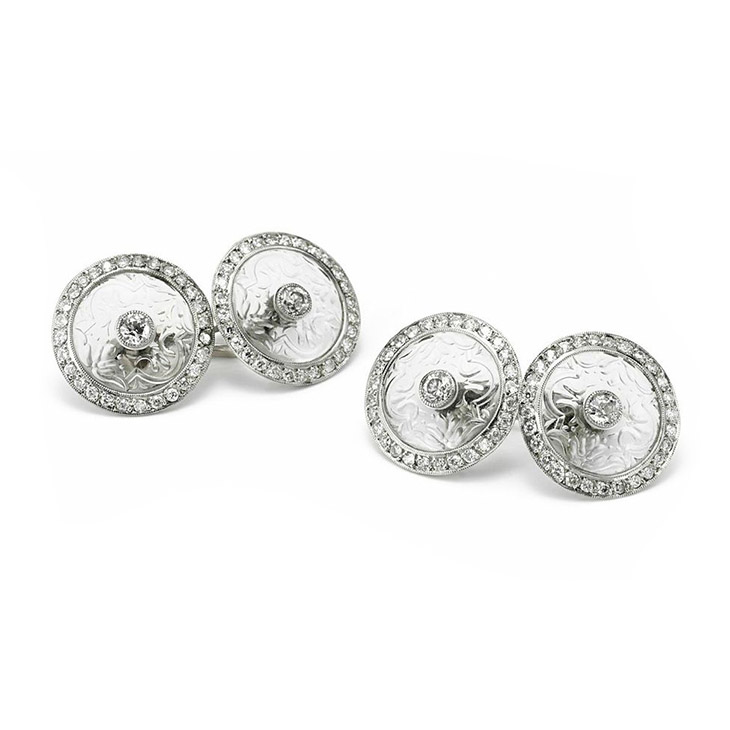 A Pair of Rock Crystal and Diamond Cufflinks, by Cartier, circa 1910
