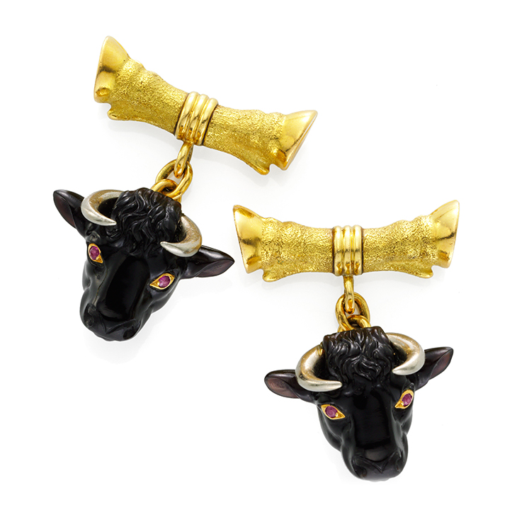 A Pair of Carved Onyx, Ruby and Gold Cufflinks, by Tiffany & Co.