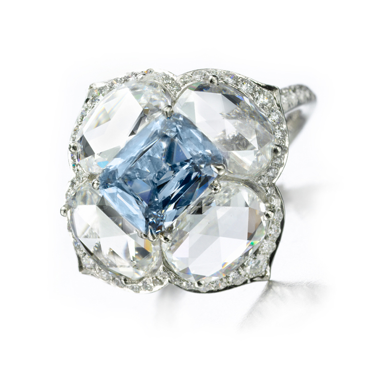 A Diamond Ring centering upon a Fancy Intense Blue Diamond of 1.15 carats, by Bhagat