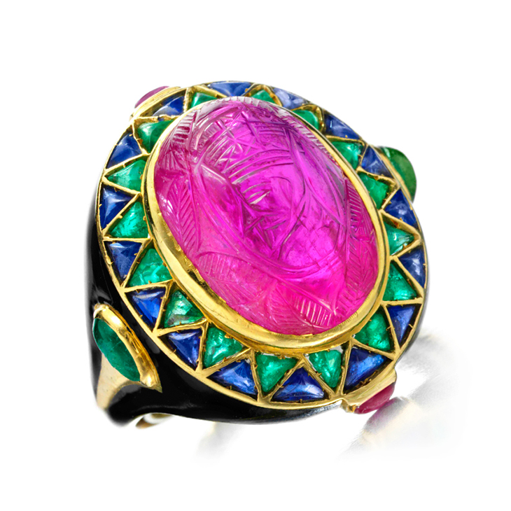 An Egyptian Revival Ruby, Emerald, Sapphire and Enamel Ring, by Cartier, circa 1928