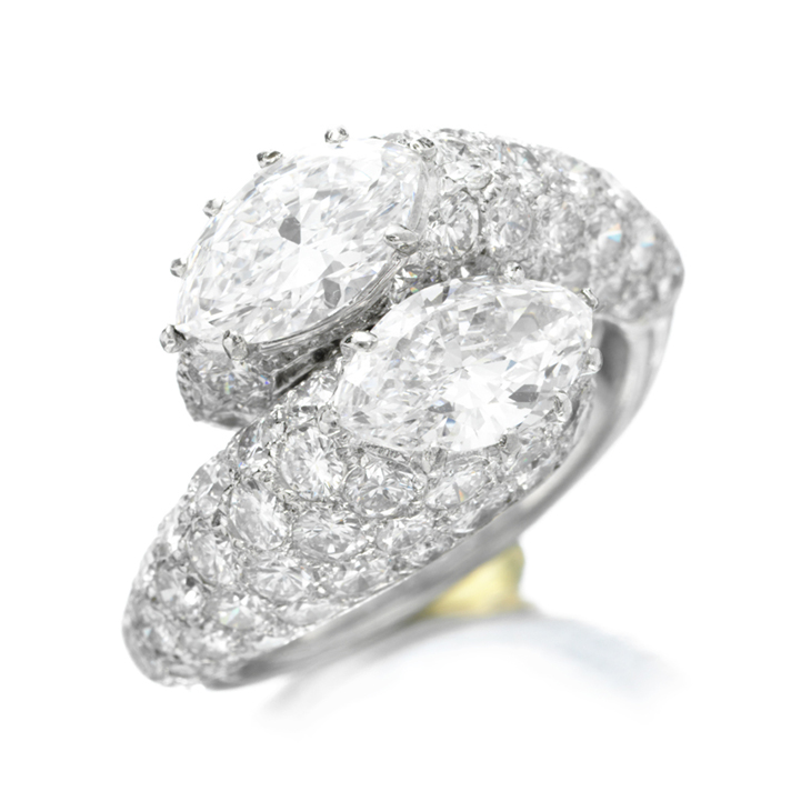 A Diamond and Platinum Crossover Ring, by Cartier