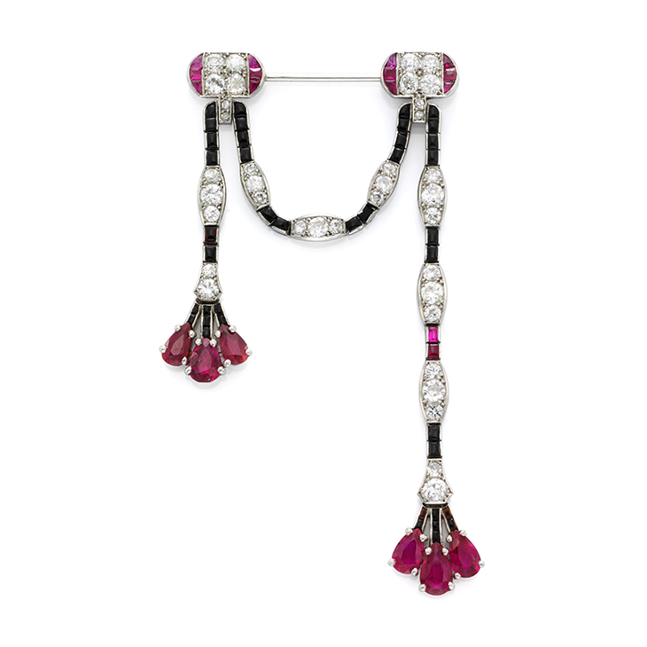 An Art Deco Ruby, Diamond and Onyx Brooch, by Cartier
