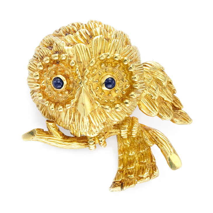A Gold and Sapphire Owl Brooch, by Cartier, circa 1960