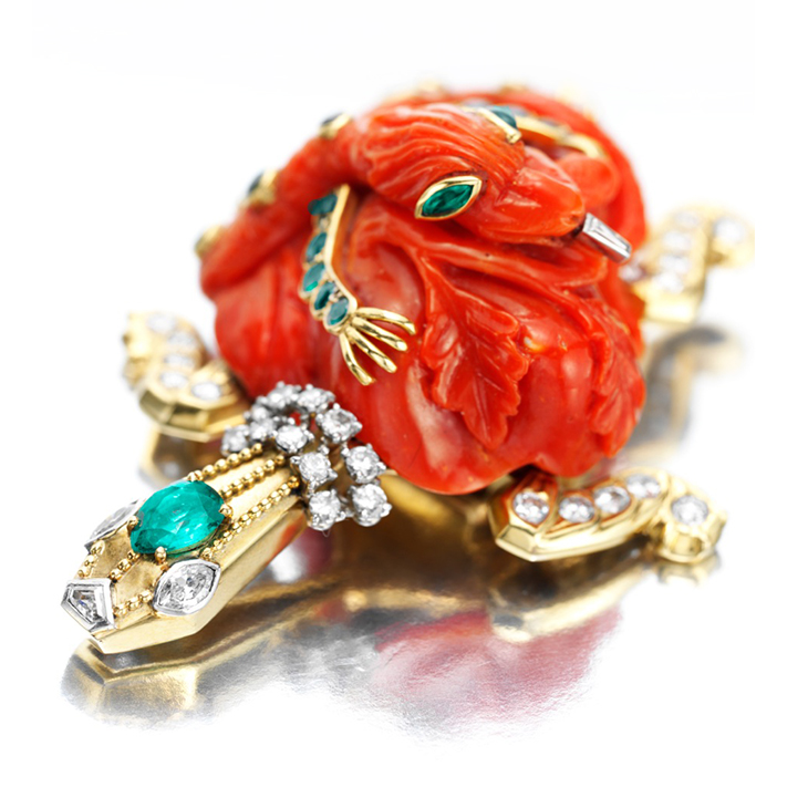 A Carved Coral, Emerald and Diamond Turtle Brooch, by Cartier, circa 1960