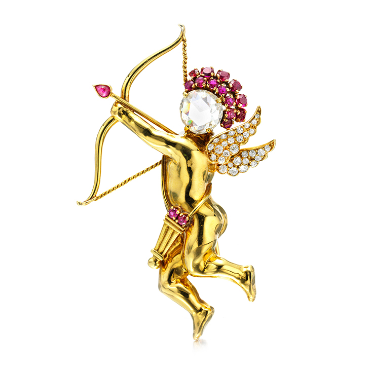 A Ruby and Diamond Cupid Brooch, by Van Cleef & Arpels