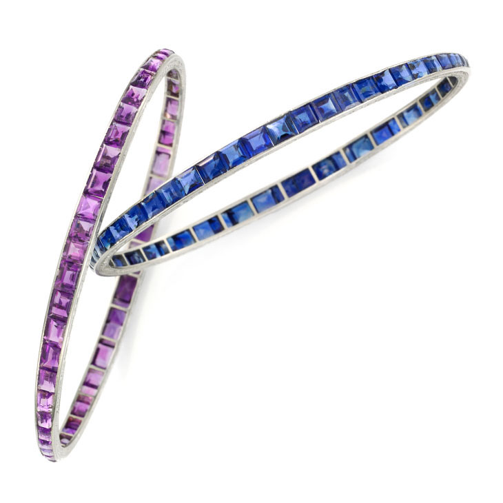 A Pair of Art Deco Sapphire and Amethyst Bangle Bracelets, by Van Cleef & Arpels, circa 1920