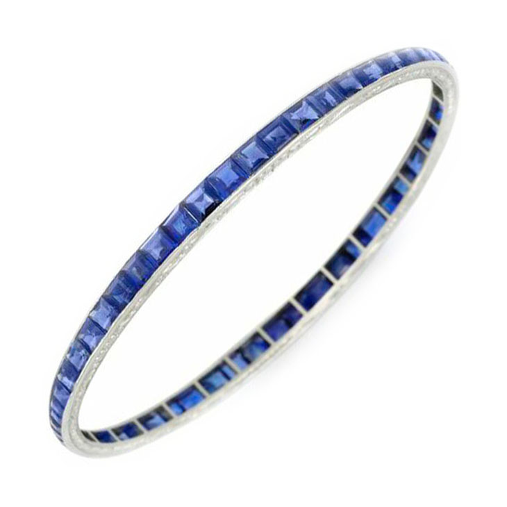 An Art Deco Sapphire and Platinum Bangle, by Van Cleef & Arpels, circa 1920