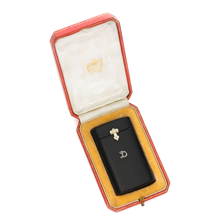 An Art Deco Onyx and Diamond Cigarette Case, by Cartier