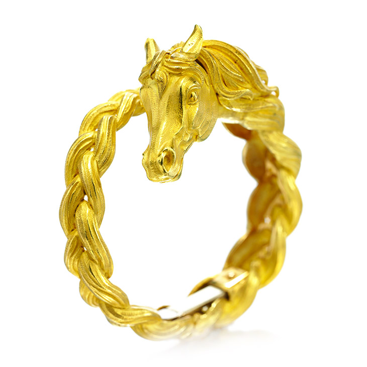 A Gold Horse Bracelet, by Hermes, circa 1960