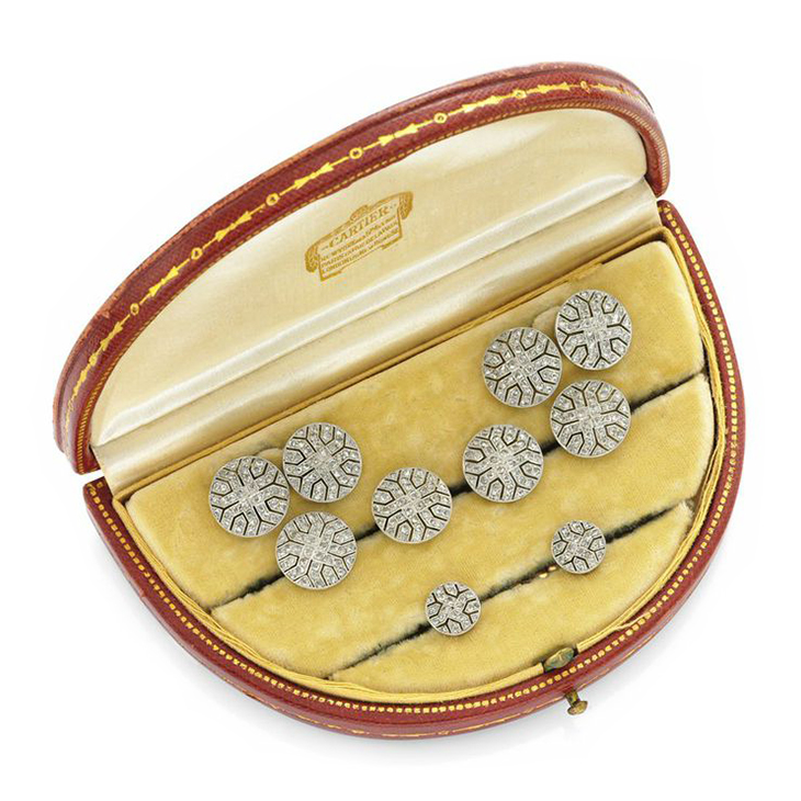 An Art Deco Diamond and Platinum Dress-set, in a fitted case, by Cartier, circa 1920