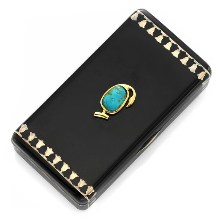 An Egypt Revival Enamel, Turquoise, Gold and Silver Cigarette Case, by Cartier, circa 1928