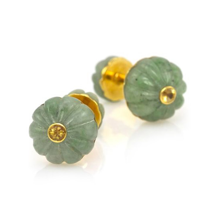 A Pair of Jade and Yellow Sapphire Cufflinks, by Cartier