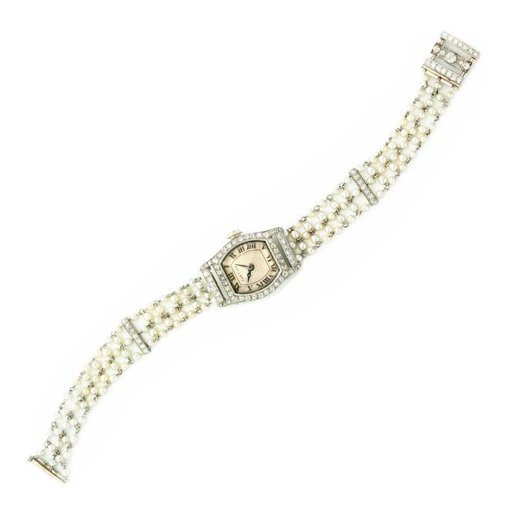 An Art Deco Seed Pearl and Diamond Wristwatch, by Cartier, circa 1920