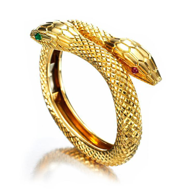 An Emerald, Ruby and Gold Bracelet, by Cartier