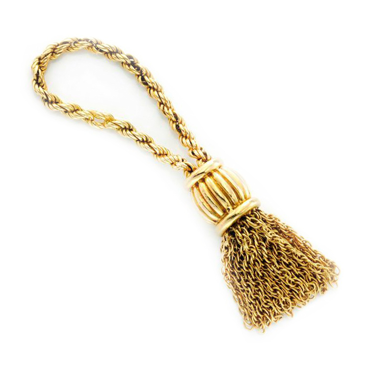 A Textured Gold Tassel Keychain, by Hermes, circa 1970