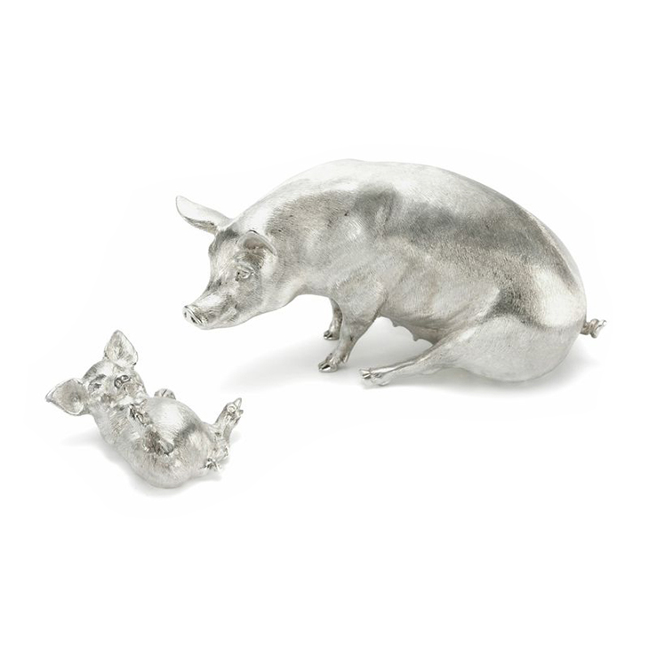 A Pair of Sterling Silver Pigs, by Asprey
