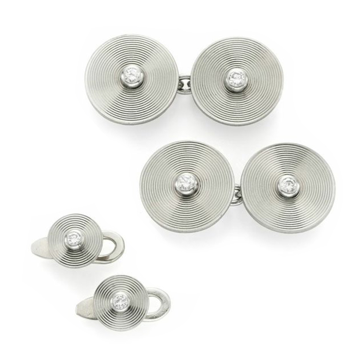A Pair of Diamond and Engine-turned Platinum Cufflinks, with two studs, by Cartier, circa 1920