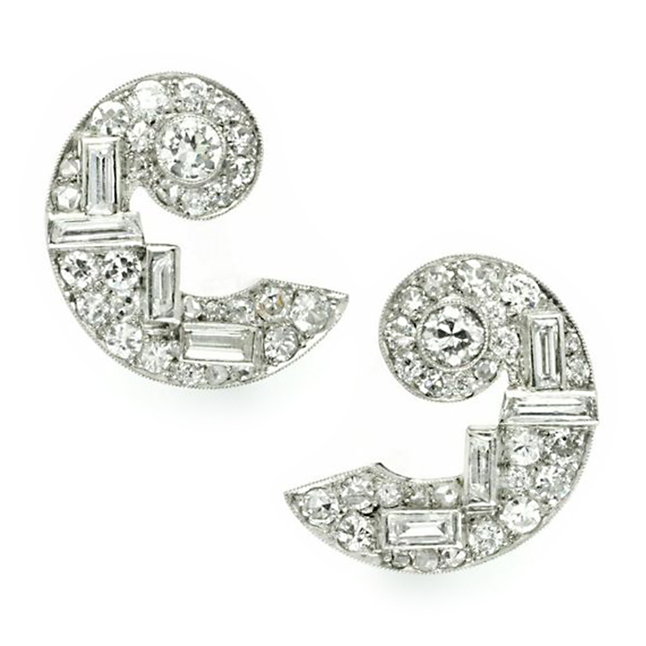 A Pair of Art Deco Diamond and Platinum Ear Clips, by Cartier, circa 1930