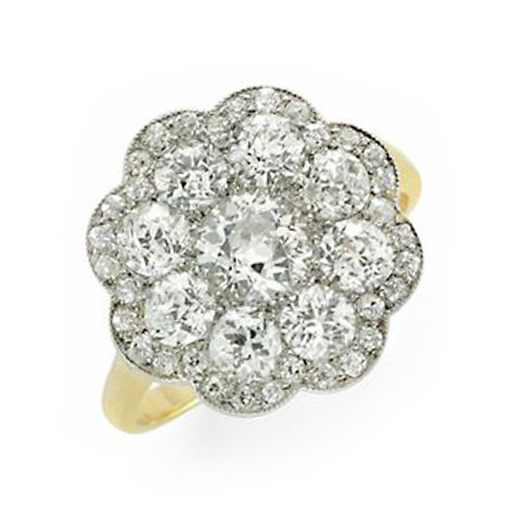 An Edwardian Diamond, Platinum and Gold Ring, circa 1910