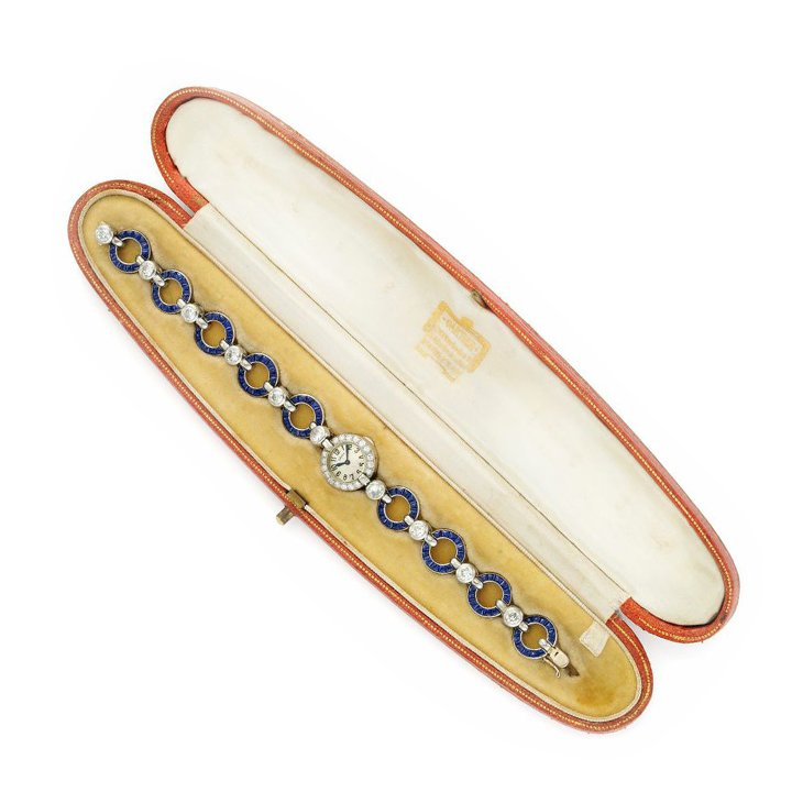 An Art Deco Buff top Sapphire and Diamond Bracelet Wristwatch, by Cartier, circa 1930