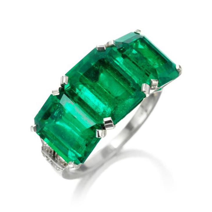 An Art Deco Three-stone Emerald and Diamond Ring, by Cartier, circa 1920