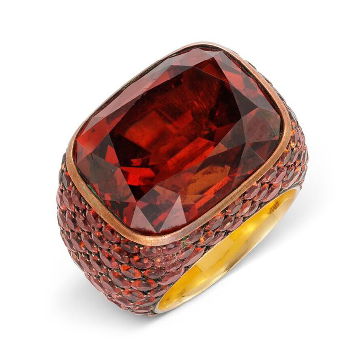 A Garnet and Sapphire Ring, by Hemmerle