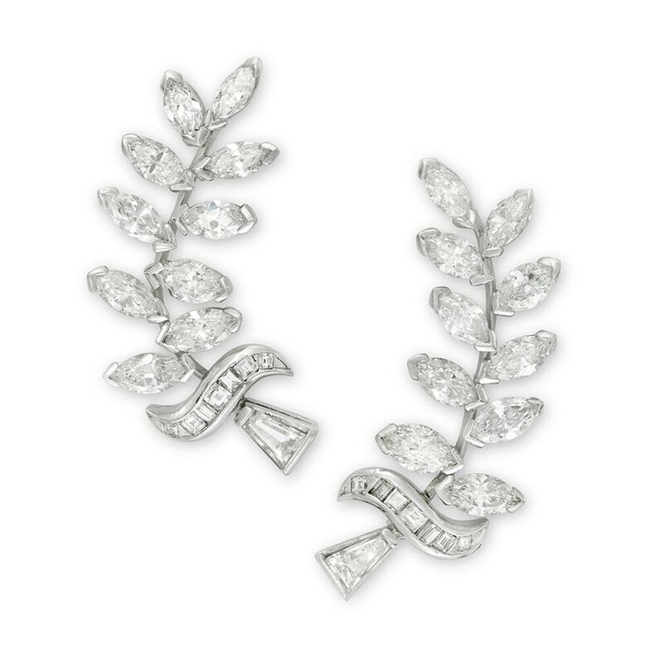 A Pair of Marquise, Baguette and Square-cut Diamond Ear Clips, of foliate design, circa 1945