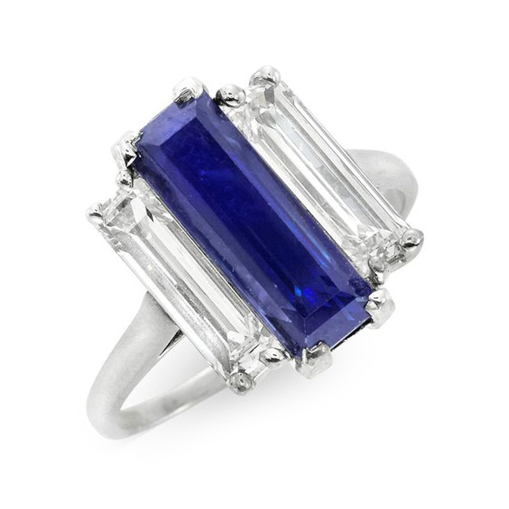A Three Stone Sapphire and Diamond Ring