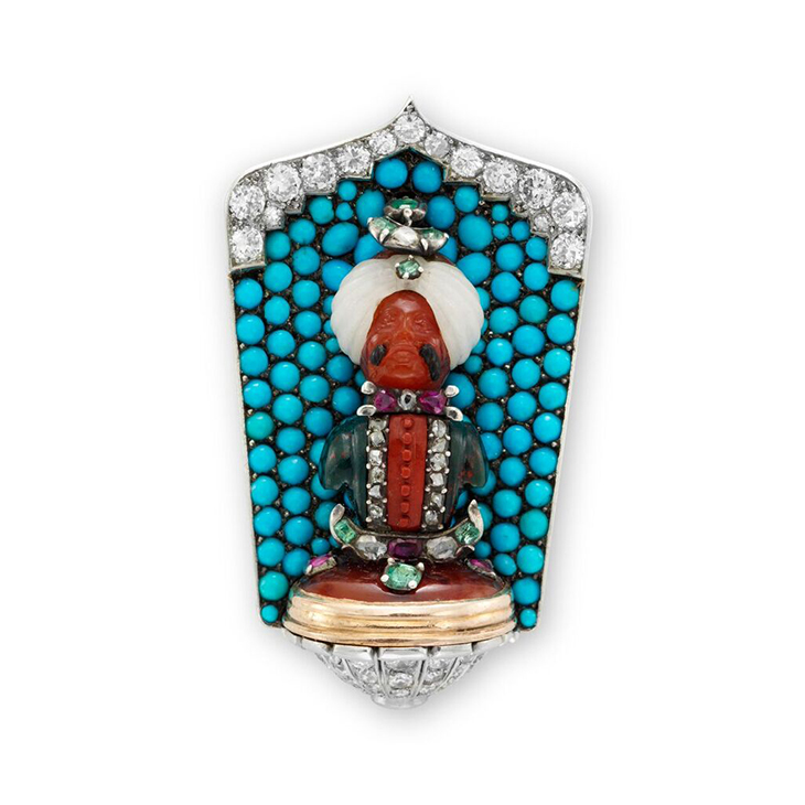 An Art Deco Multi-gem and Diamond 'Maharaja' Clip Pin, by Cartier, circa 1925
