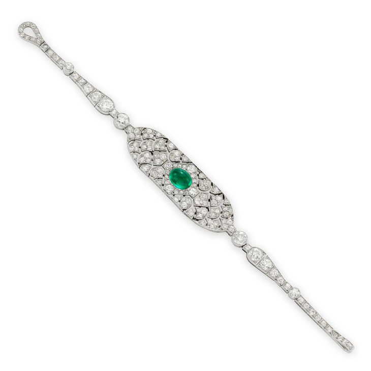 An Art Deco Cabochon Emerald and Diamond Strap Bracelet, by Cartier, circa 1920