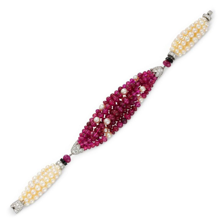A Natural Pearl, Ruby, Onyx and Diamond Torsade Bracelet, by Van Cleef & Arpels, circa 1935