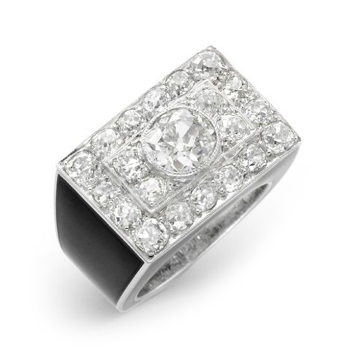 A Diamond and Enamel Plaque Ring
