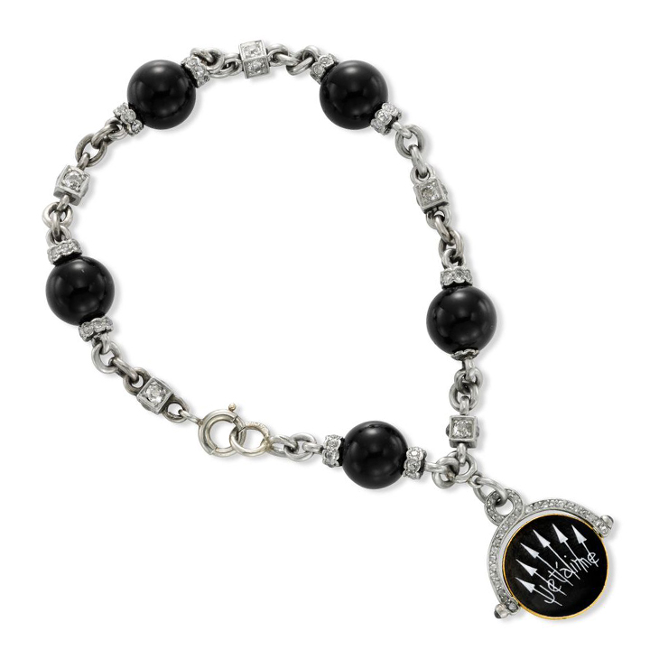 An Art Deco Onyx, Enamel and Diamond 'Jetaime' Charm Bracelet, circa 1925