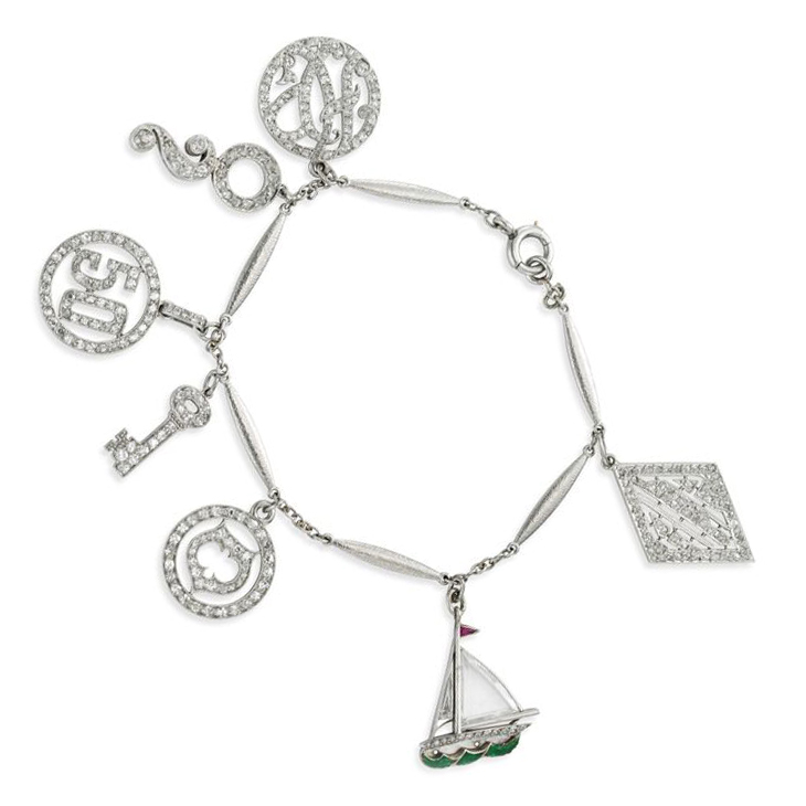 An Art Deco Diamond and Platinum Charm Bracelet, circa 1925