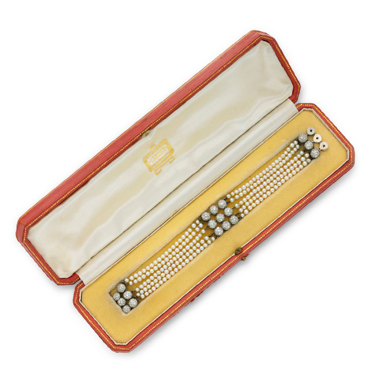 An Art Deco Multi-Strand Natural Pearl and Diamond Bracelet, by Cartier, circa 1925