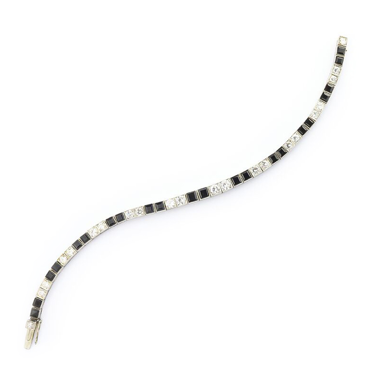 An Art Deco Onyx and Diamond Line Bracelet, circa 1925