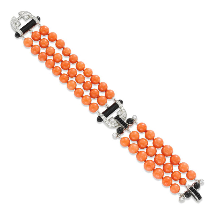 An Art Deco Coral Bead, Onyx and Diamond Bracelet, by Cartier, circa 1933