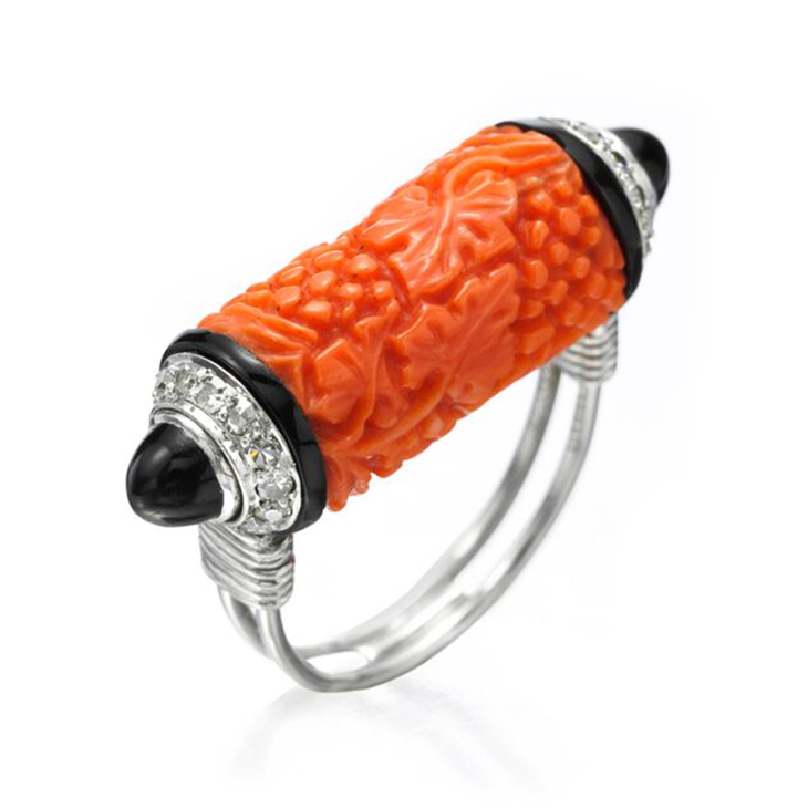 An Art Deco Carved Coral, Enamel and Diamond Ring, by Cartier, circa 1933
