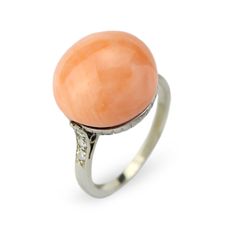 An Early 20th Century Coral Button and Diamond Ring