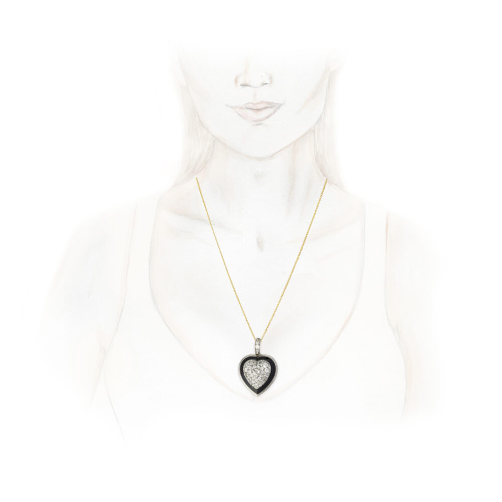 Diamond, Onyx and Platinum Heart Pendant