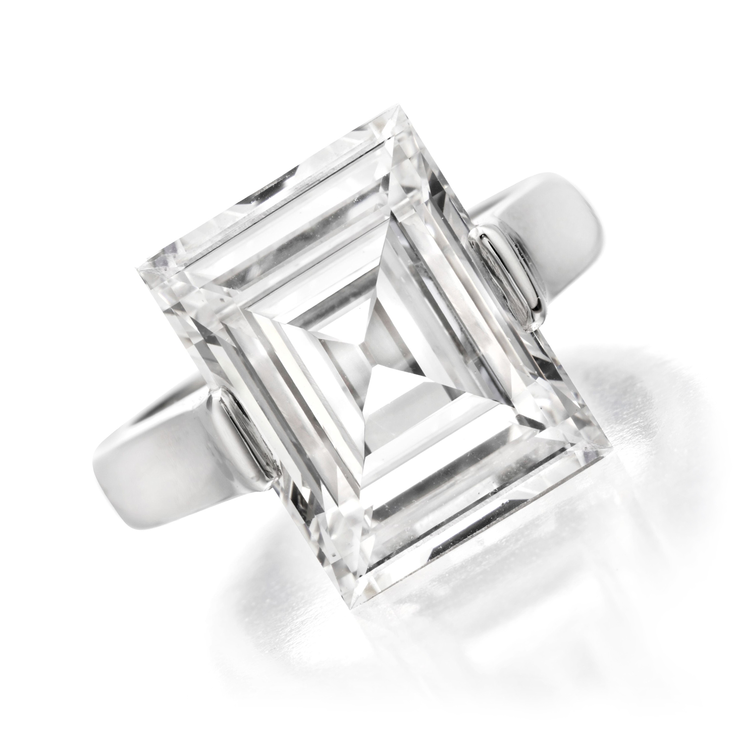 A Carre-cut Diamond Ring, weighing 7.43 carats, F Color, VS2 Clarity