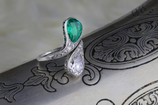 An Early 20th Century Emerald And Diamond Bypass Ring