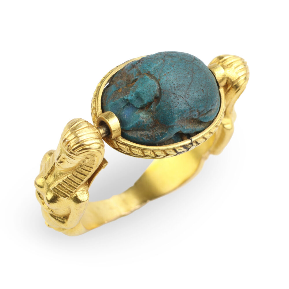 An Egyptian Revival Faience and Gold Ring