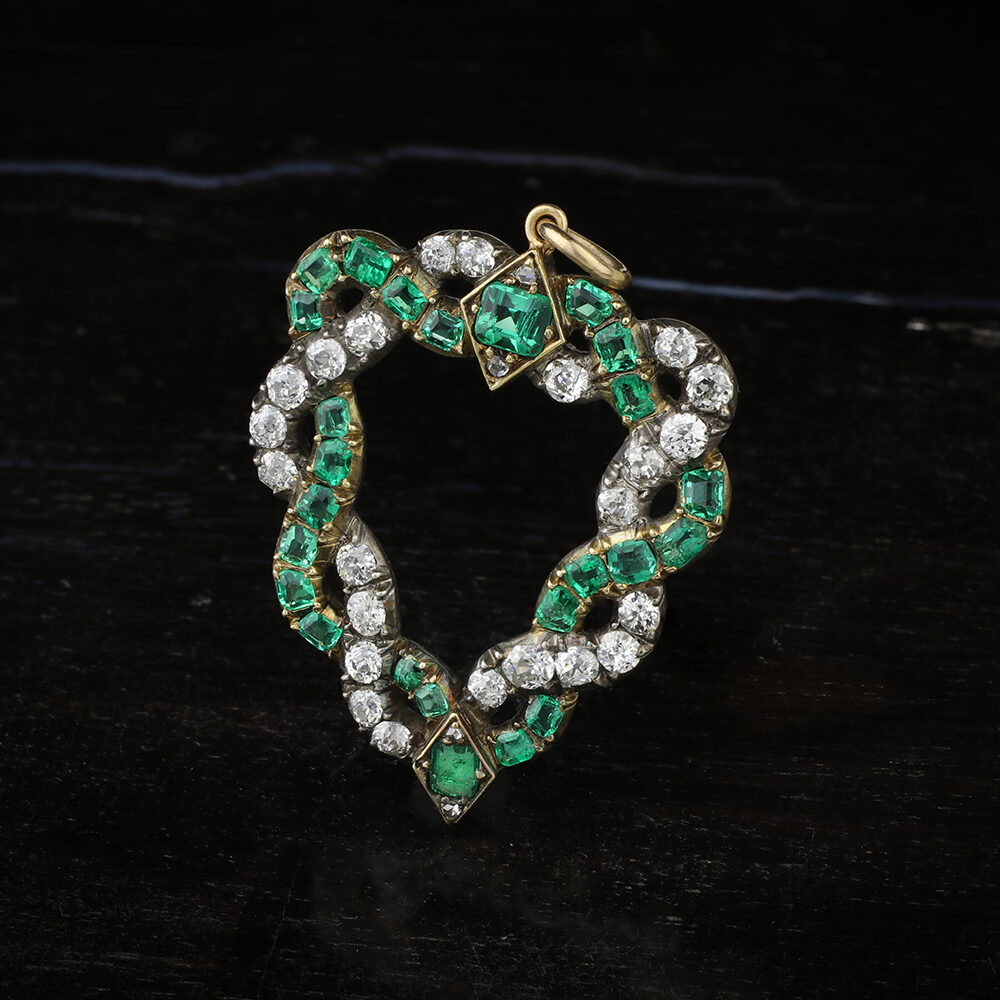 An Emerald and Diamond Heart Pendant