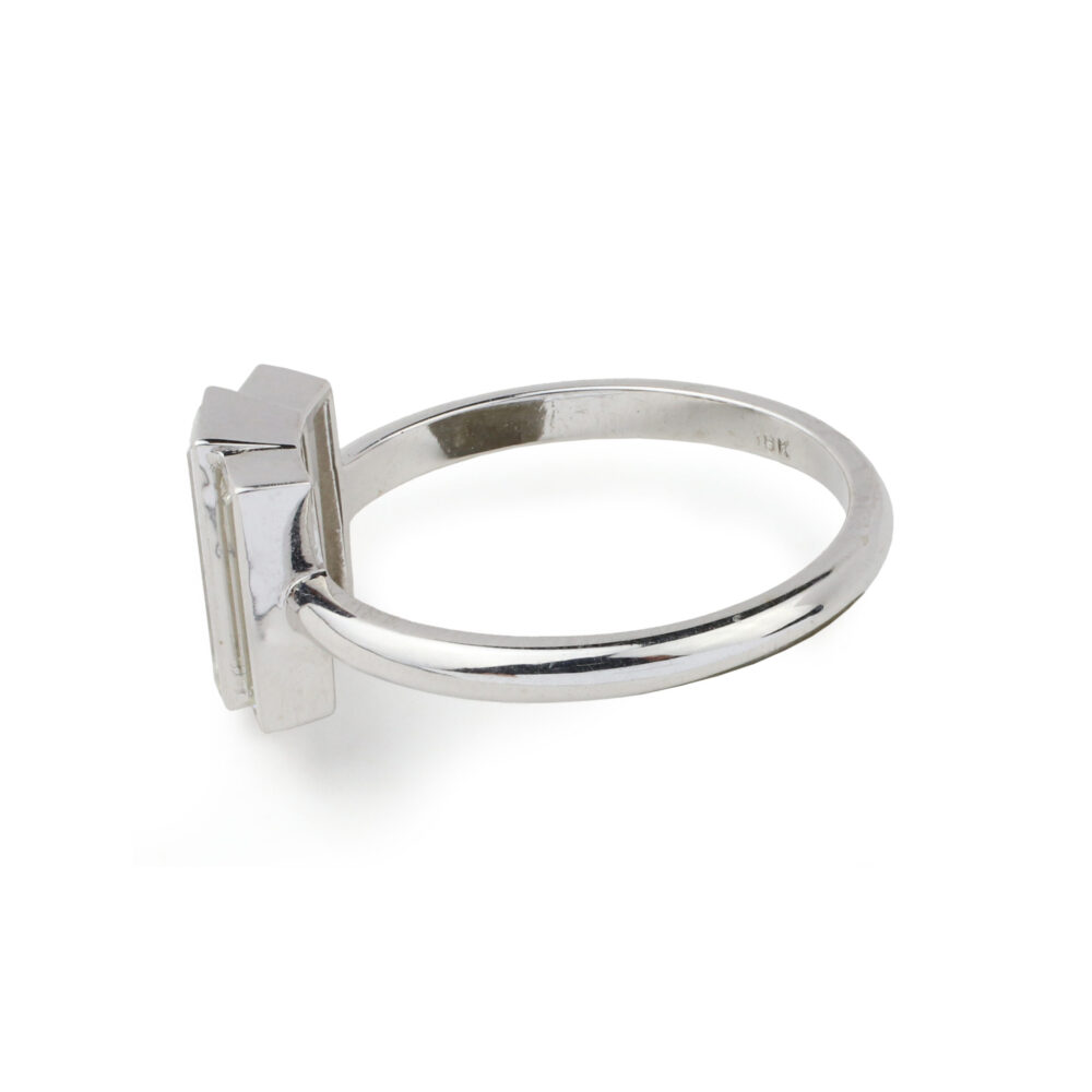 Three Stone Rectangular Step Cut Diamond Ring