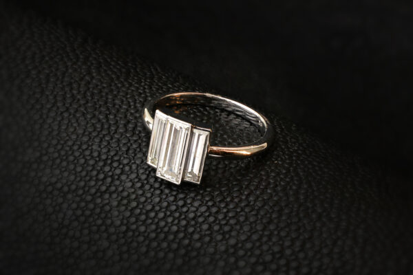 Three Stone Rectangular Step Cut Diamond Ring