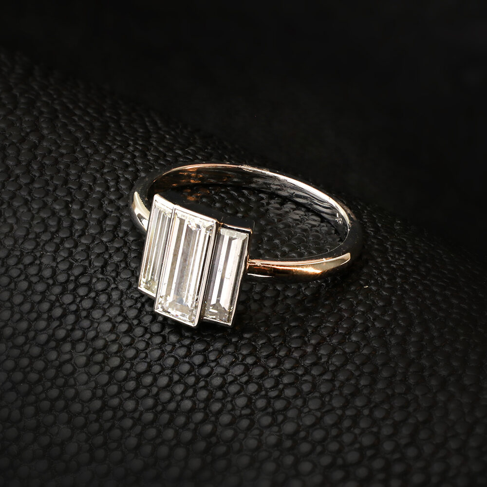 Three Stone Rectangular Step Cut Diamond Ring