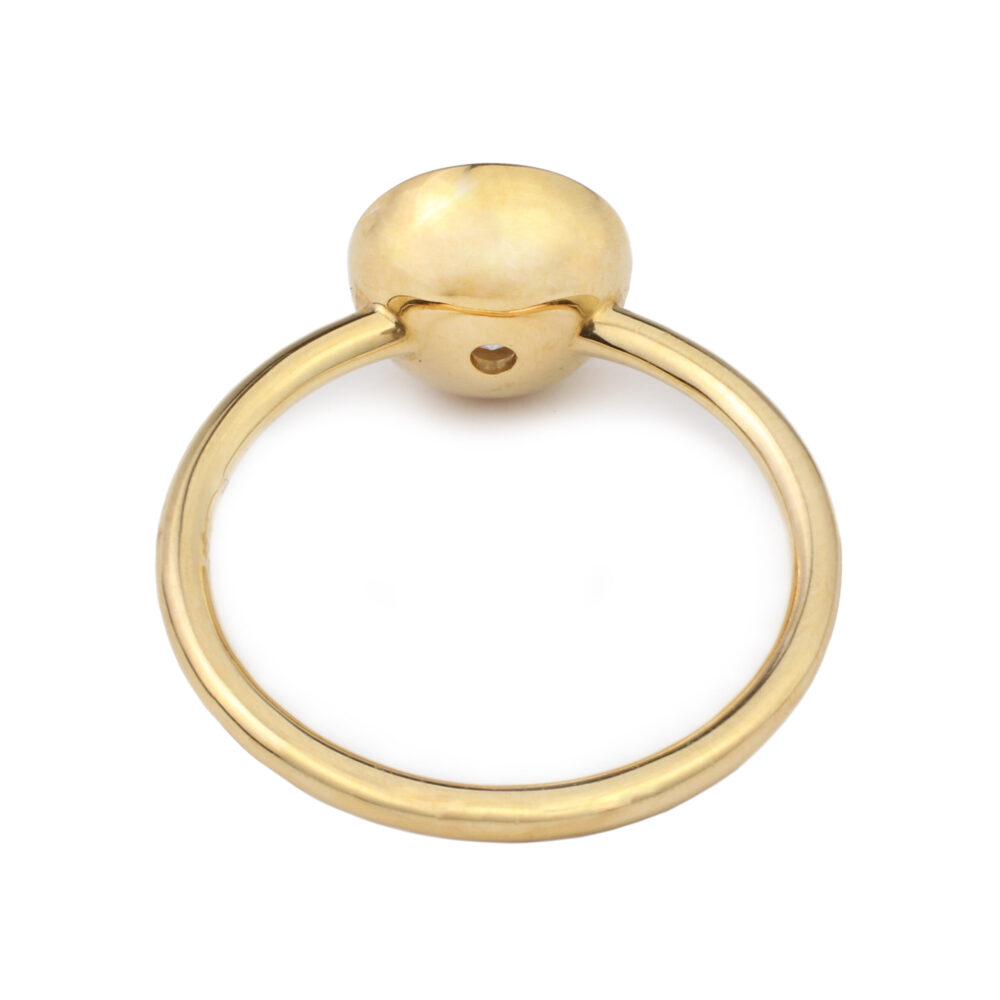 A Round Milky Diamond and Gold Ring